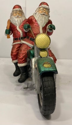 Retro Christmas Sculpture of Two Santa Clauses on Motorcycle