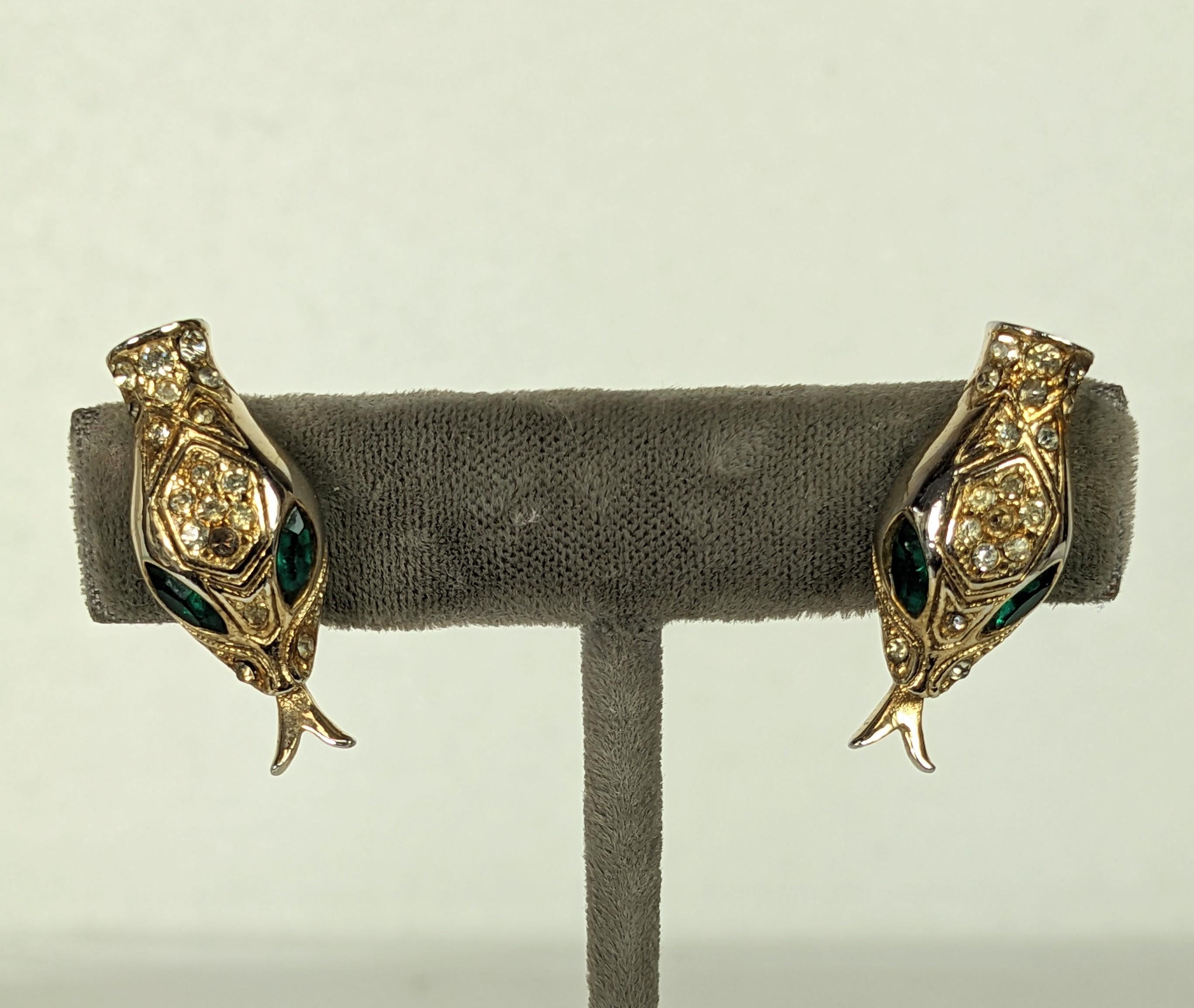 Coro Snake Head Earrings from the 1940's. Clip on fittings with pave decor with emerald paste eyes. 1940's USA. 1
