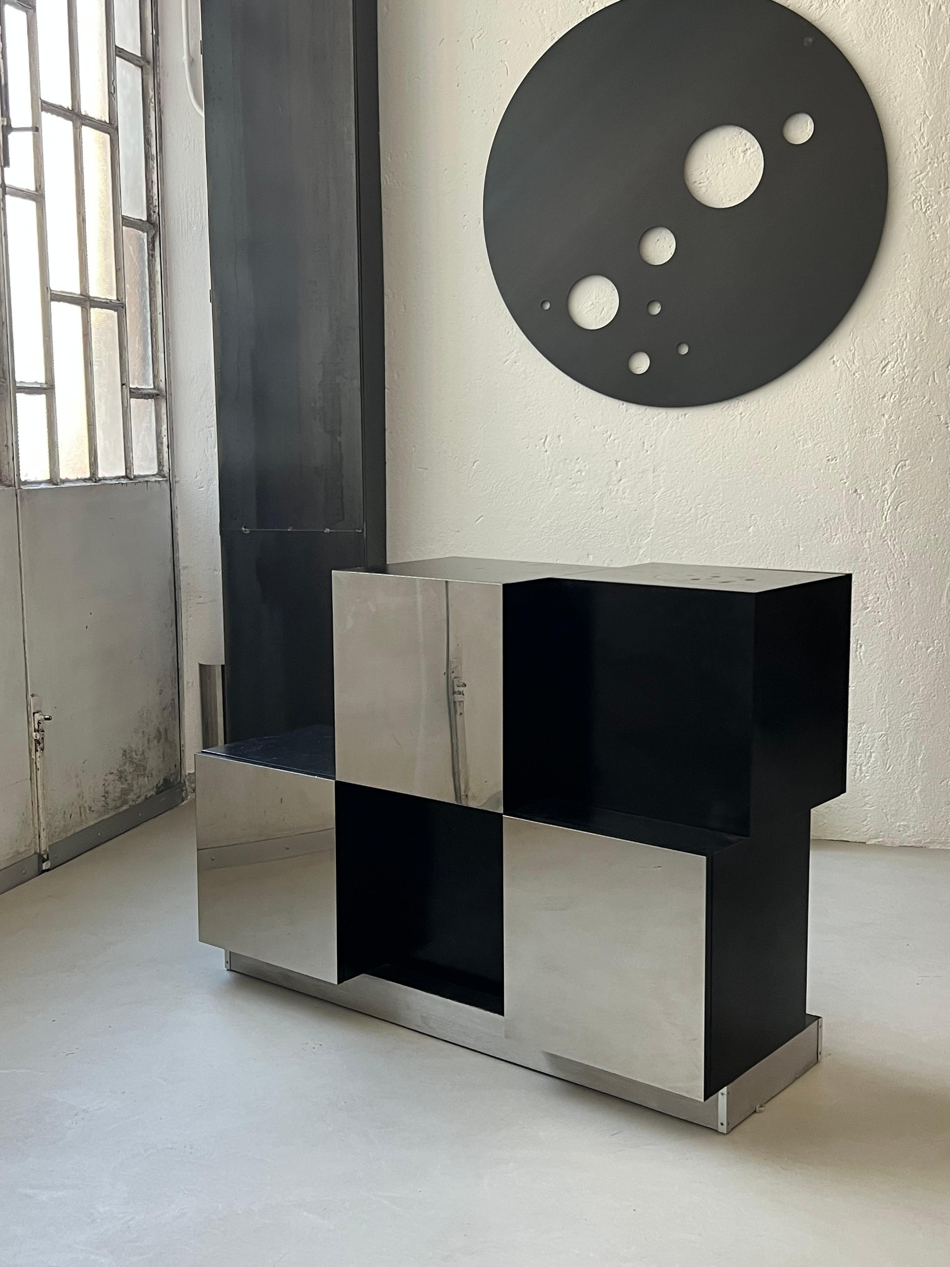 Bar cabinet / Two face cabinet / Small Sideboard / Compact bar In Black and Mirrored Cubes

Wood and stainless steel storage and bar cabinet, Italy, 1970s, stunning free standing storage unit by Italian designer Roberto Monsani for Acerbis. This