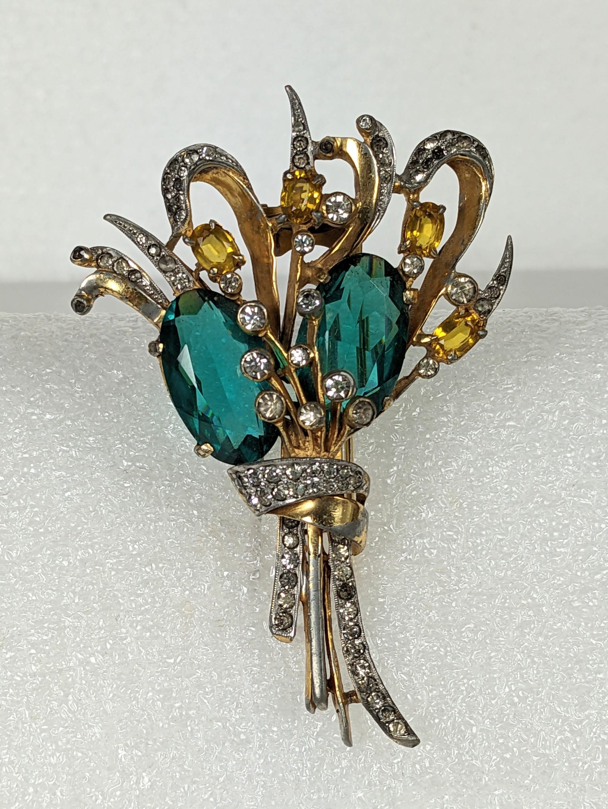 Large Raph DeRosa Retro oval cut faux emerald and topaz double bouquet clip brooch with crystal rhinestone pave accents. Marked DeRosa on clip. Good Condition: Wide 2.75