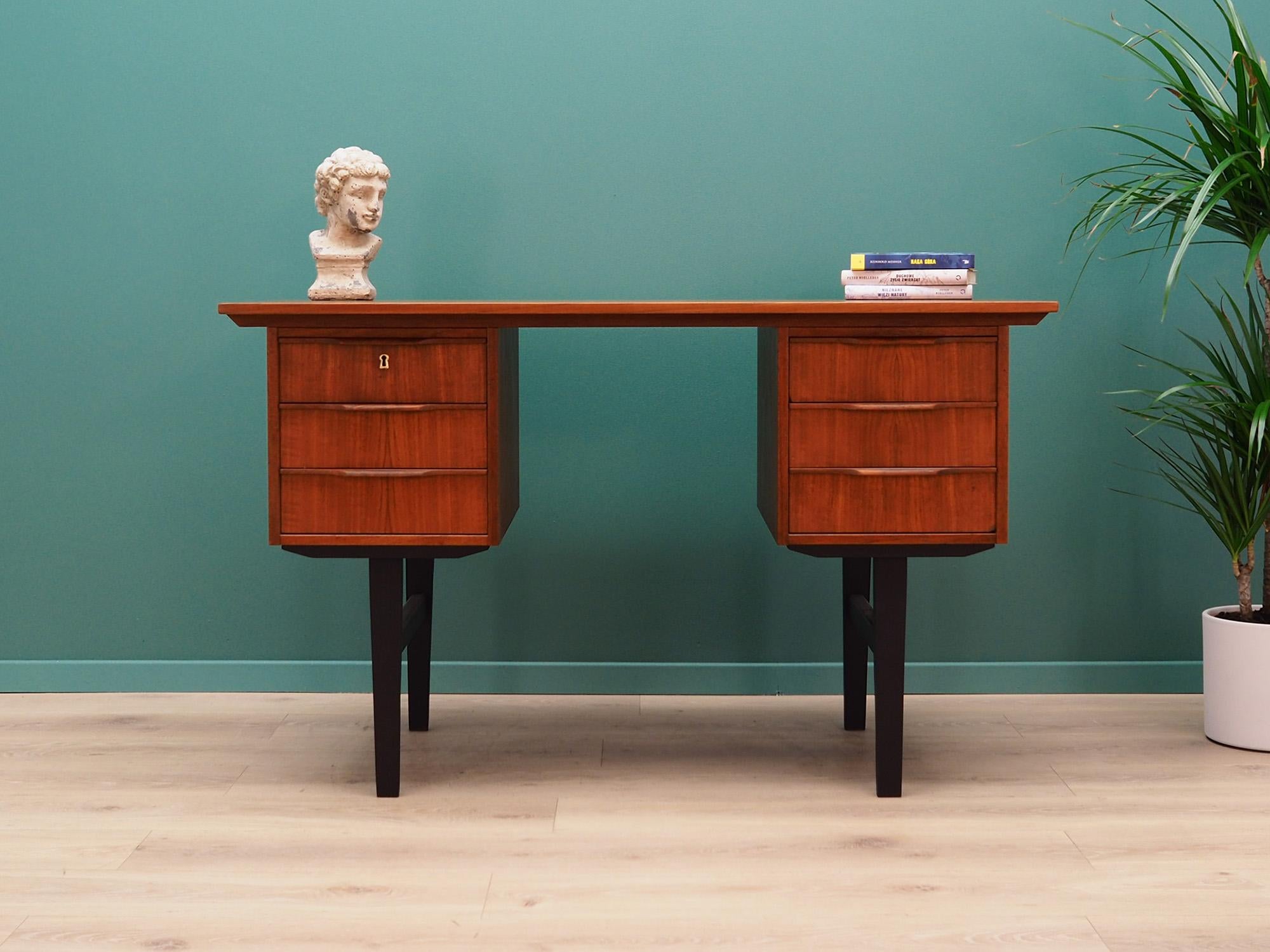 Classic desk from the 1960s-1970s. Danish design, Minimalist form. Furniture finished with teak veneer. Desk has six drawers, no key included. Preserved in good condition (minor bruises and scratches) - directly for use.

Dimensions: height 74.5