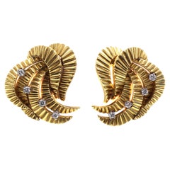 Clips d'oreilles rétro en or jaune 18 carats et diamants