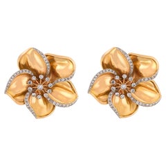 Retro diamond 18k yellow gold flower brooch pair
