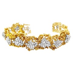 Bracelet rétro grappe de diamants en or