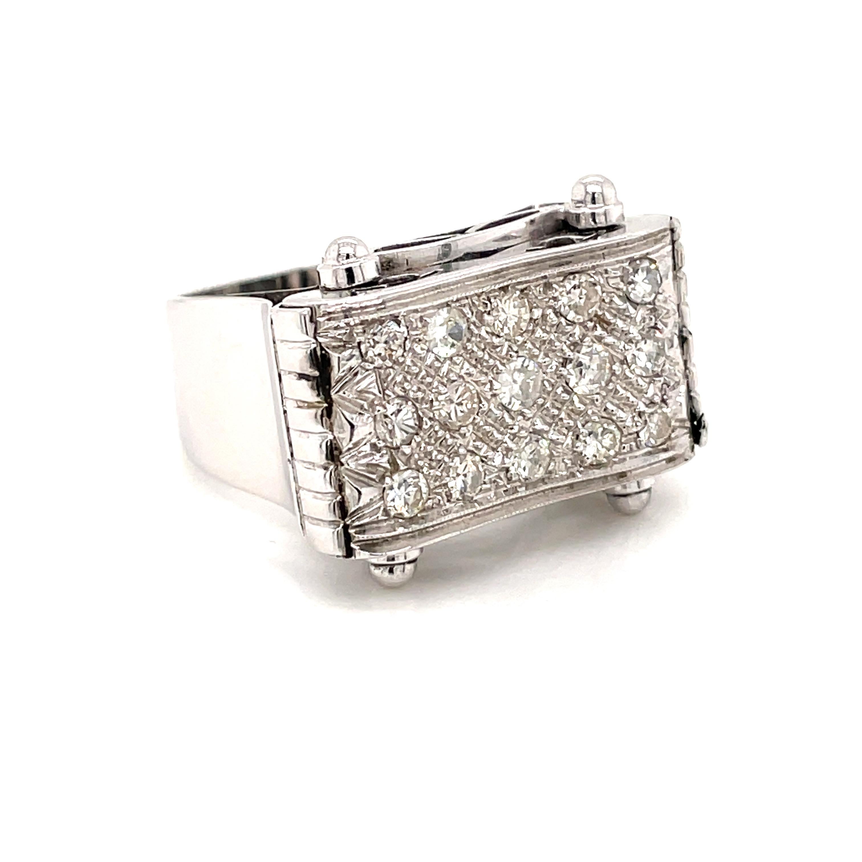 This beautiful Retro cocktail ring is crafted in 18k white gold and jeweled with 15 sparkling old mine cut diamonds weighing 1 total carats G-H color VVS clarity. Circa 1950

CONDITION: Pre-owned - Excellent
METAL: 18k Gold
GEM STONE: Diamond 1
