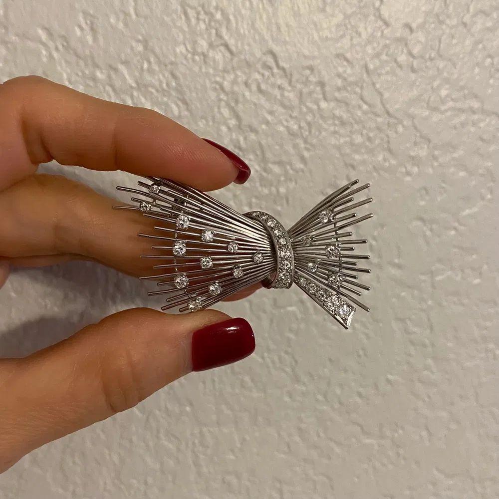 Rétro Spilla a spruzzo retrò con diamante in oro Estate Jewelry in vendita