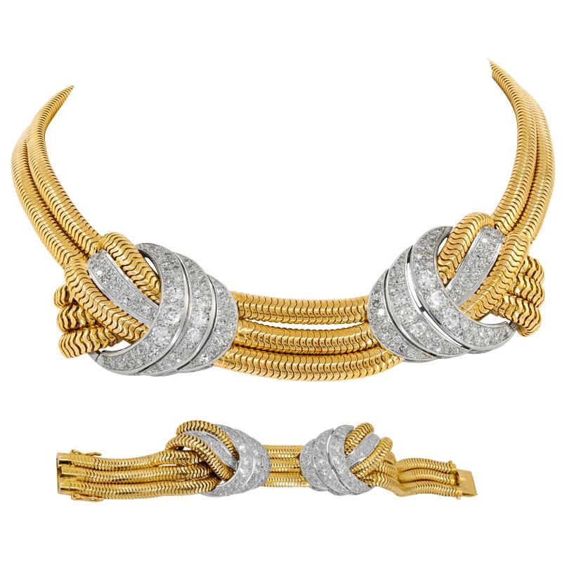 Ensemble collier et bracelet rétro en or jaune et blanc avec chaîne serpentine et diamants