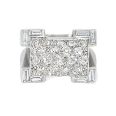 Retro Diamond, Platinum, and Gold Ring of Geometric Sculptural Design