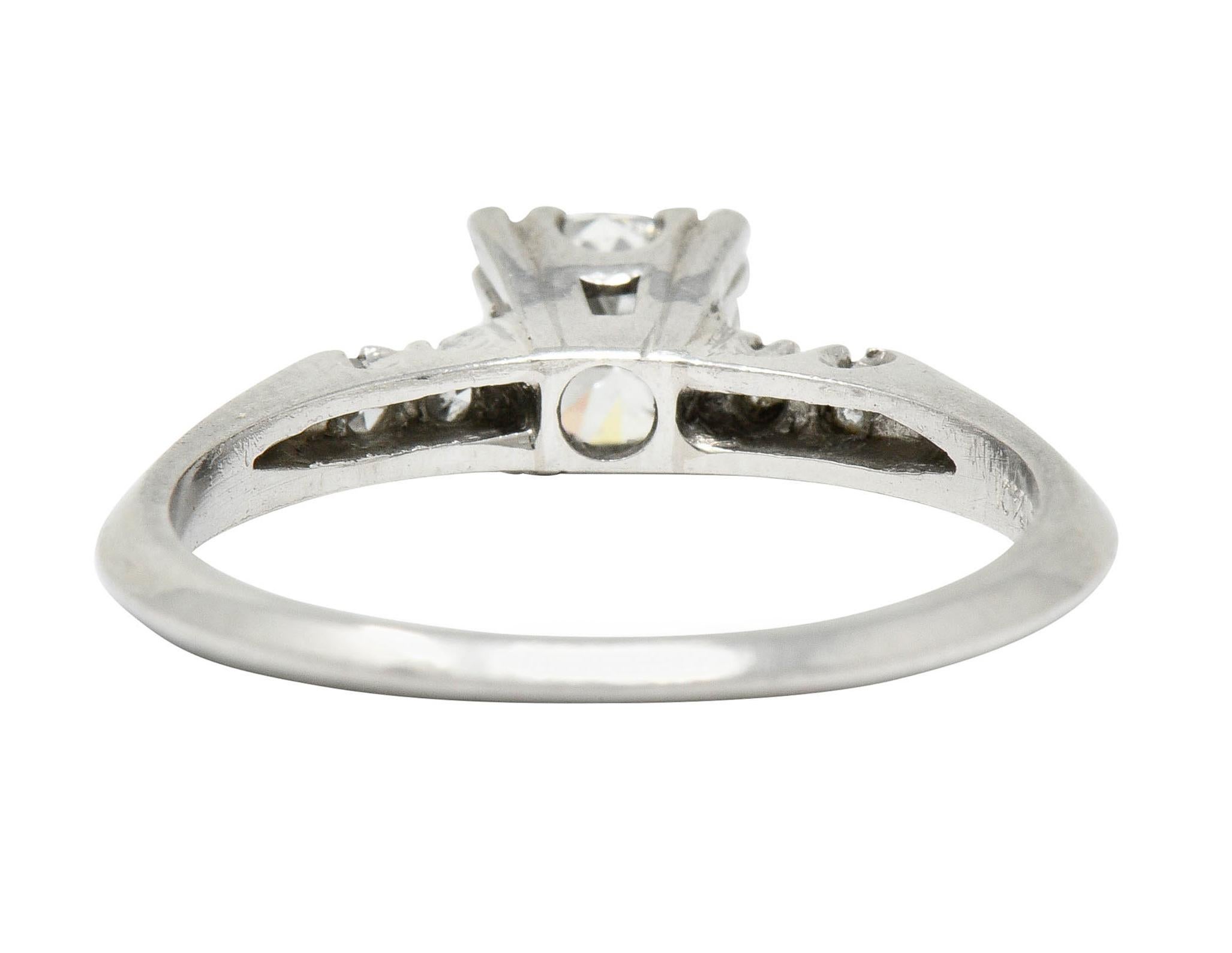 Retro Diamond Platinum Five-Stone Engagement Ring In Excellent Condition In Philadelphia, PA