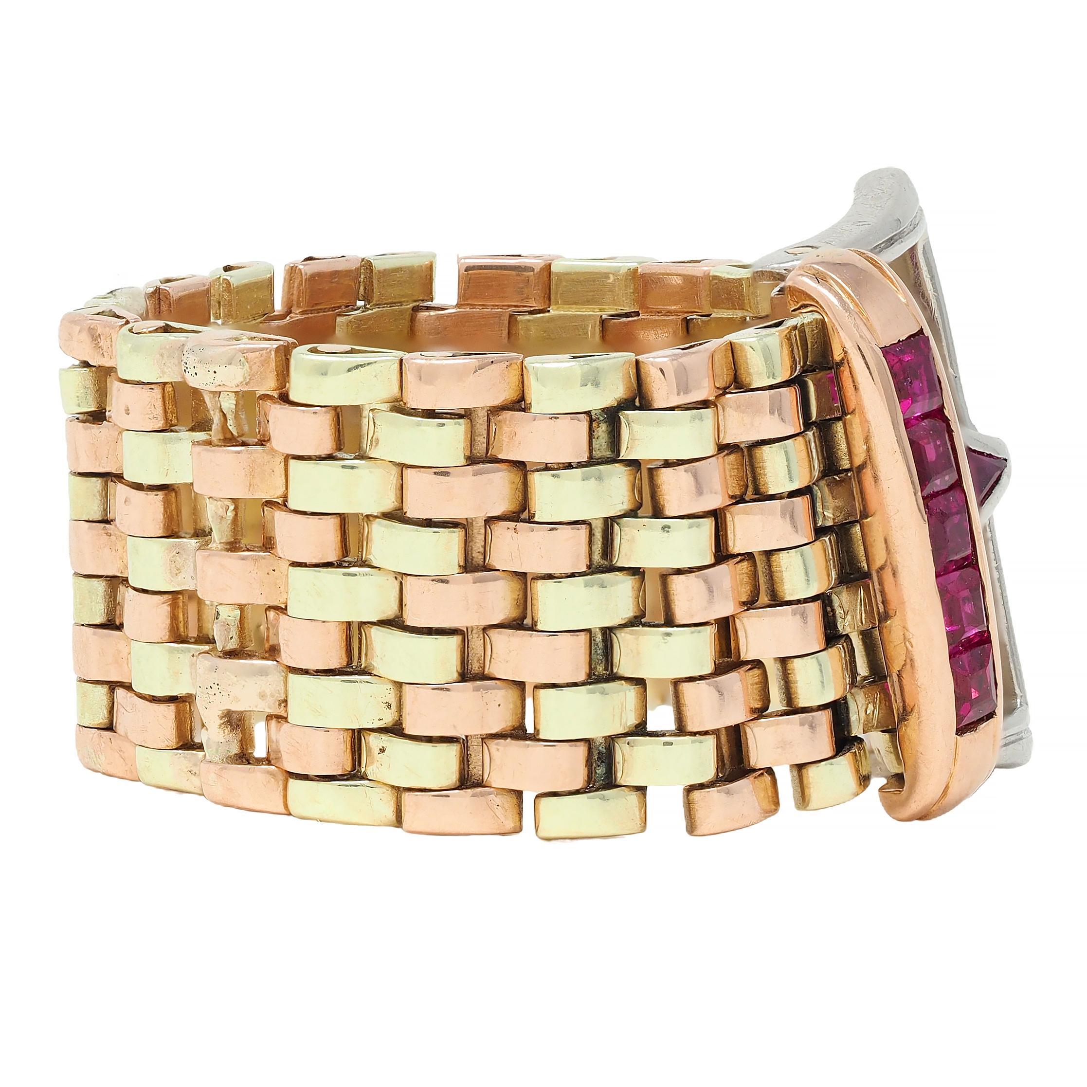 Designed as a yellow and rose gold panther link mesh band 
Featuring a dimensional platinum and rose gold buckle 
Platinum is bead set with round brilliant cut diamonds
Weighing approximately 0.12 carat total - eye clean and bright
With kite and