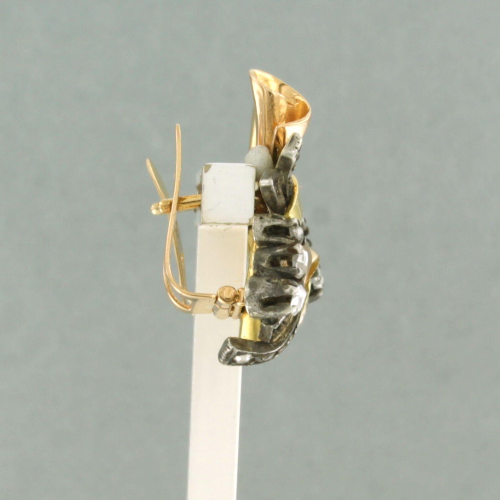 RETRO - Orecchini a clip in oro e argento 14k bicolore con rubino e diamanti rosa fino a 0,10 carati - G/H - SI

Descrizione dettagliata:

Gli orecchini a clip sono lunghi 2,3 cm e larghi 1,6 cm.

Peso totale: 6,3 grammi

Set con:

- 2 rubini