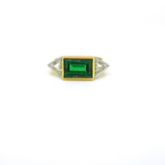 Retro Emerald and Triangle Cut Diamonds Yellow Gold Platinum Engagement Ring