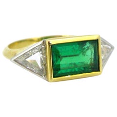 Retro Emerald and Triangle Cut Diamonds Yellow Gold Platinum Engagement Ring