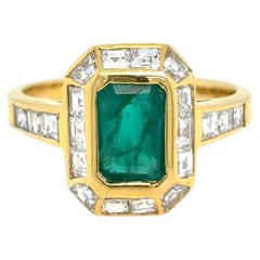 Anello d'oro con diamante smeraldo retrò