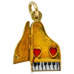 Retro Enamel 14 Karat Gold Articulated Hidden Heart Piano Charm