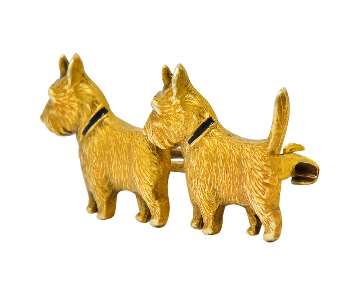 Designed as two sweet Scottie dogs

With highly detailed textured gold fur

Both accented with black enamel collars

Stamped 14K 

Measuring: 1 1/8 x 1/2 Inch

Total Weight: 2.7 Grams

Adorable. Twins. Lovable. 
 

 

Stock Number: We-3410