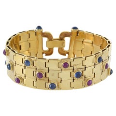 Bracciale d'epoca retrò in oro giallo 18KT con rubino cabochon e zaffiro blu