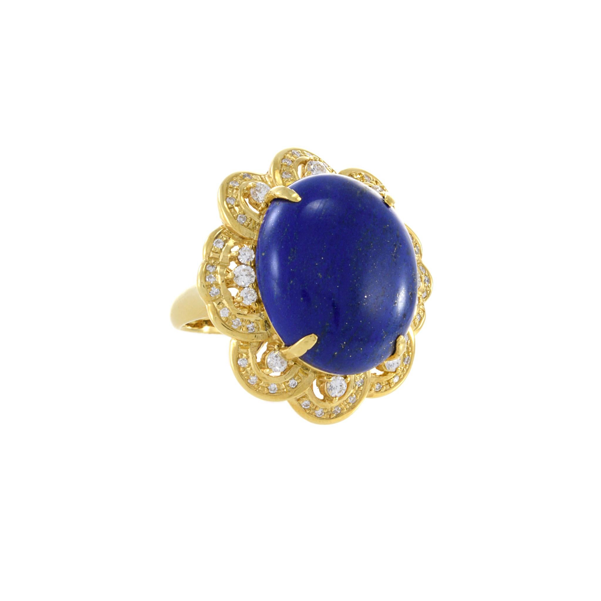 Introducing the Vintage Retro Era 18KT Yellow Gold Lapis Lazuli and Diamond Cocktail Ring. This stunning ring features a central cabochon cut natural lapis lazuli weighing 23.16 carats, surrounded by a round cut diamonds totaling 0.87 carats G color