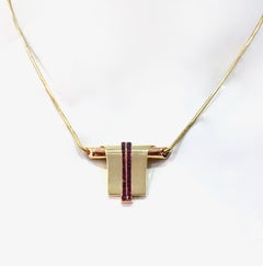Retro Era Ruby "Scroll" Pendant Necklace in 18 Karat Yellow and Rose Gold