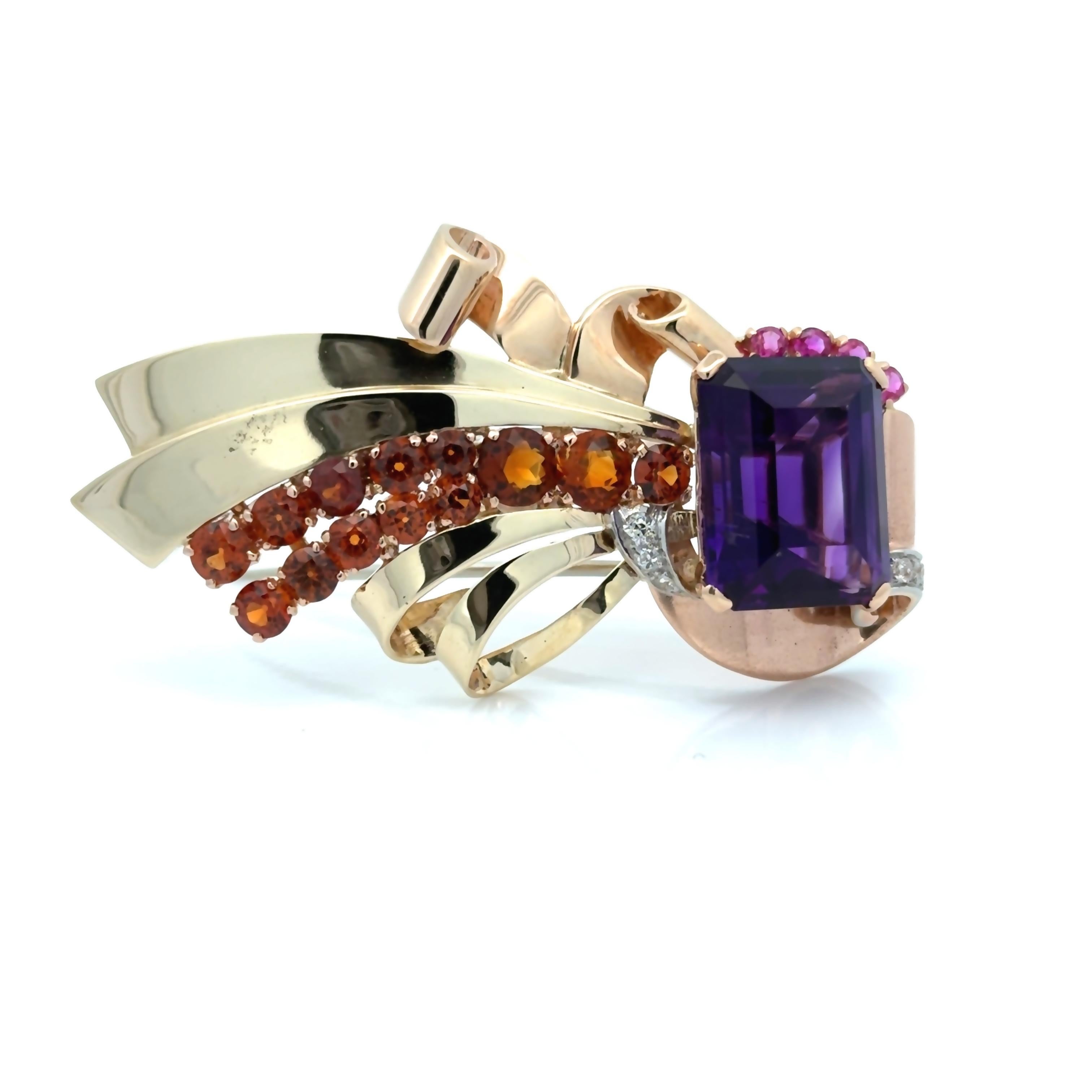 This Retro Estate brooch showcases a stunning 23.90 carat amethyst, accented with vibrant garnets, pink sapphires, and sparkling diamonds. Elevate your look with this timeless piece, perfect for adding a touch of elegance and luxury to any