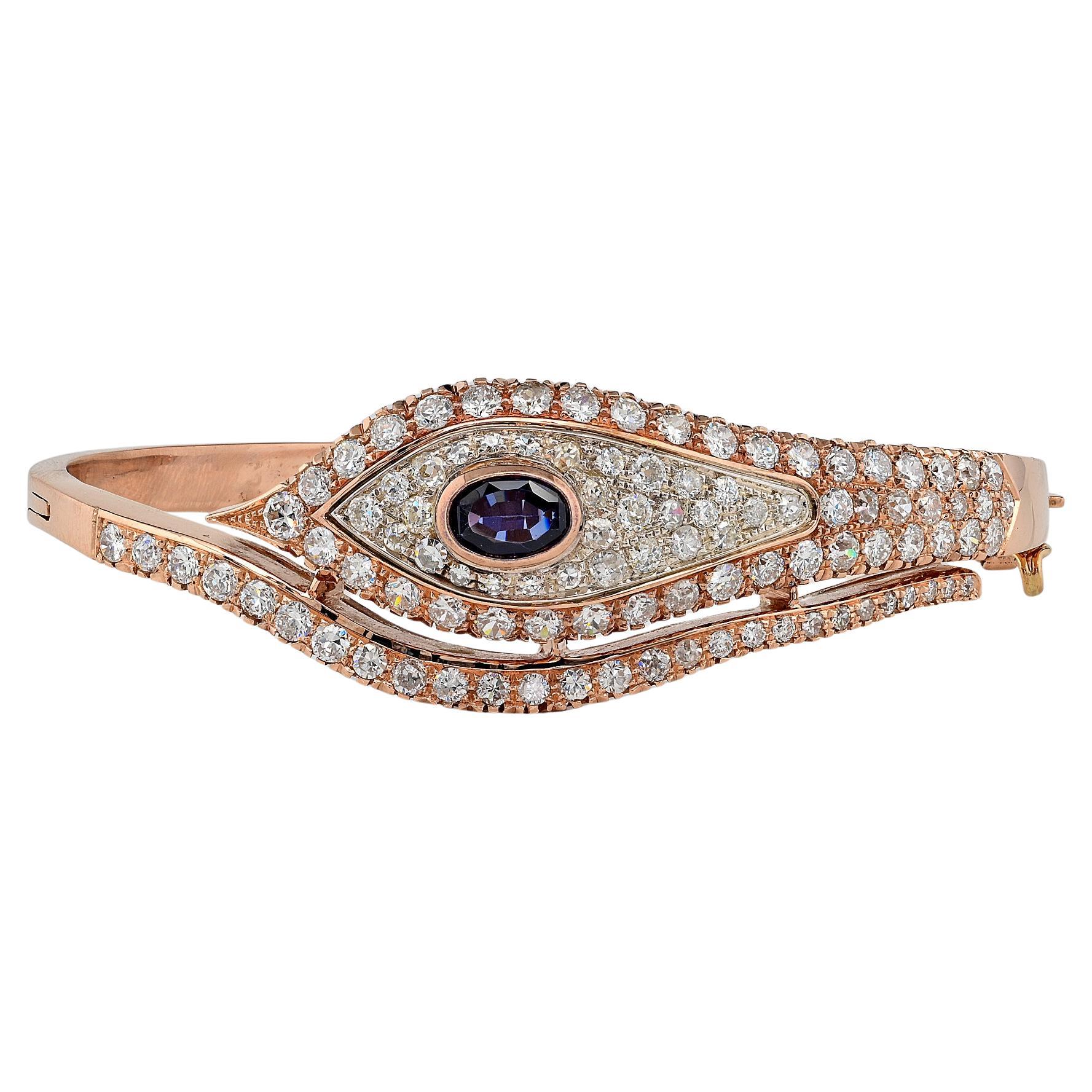 Retro Evil Eye 1.10 Ct Verneuil Sapphire 4.90 Ct Diamond Rare Bangle  9 KT gold For Sale