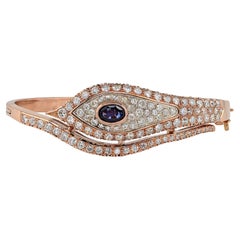 Retro Evil Eye 1.10 Ct Verneuil Sapphire 4.90 Ct Diamond Rare Bangle  9 KT gold
