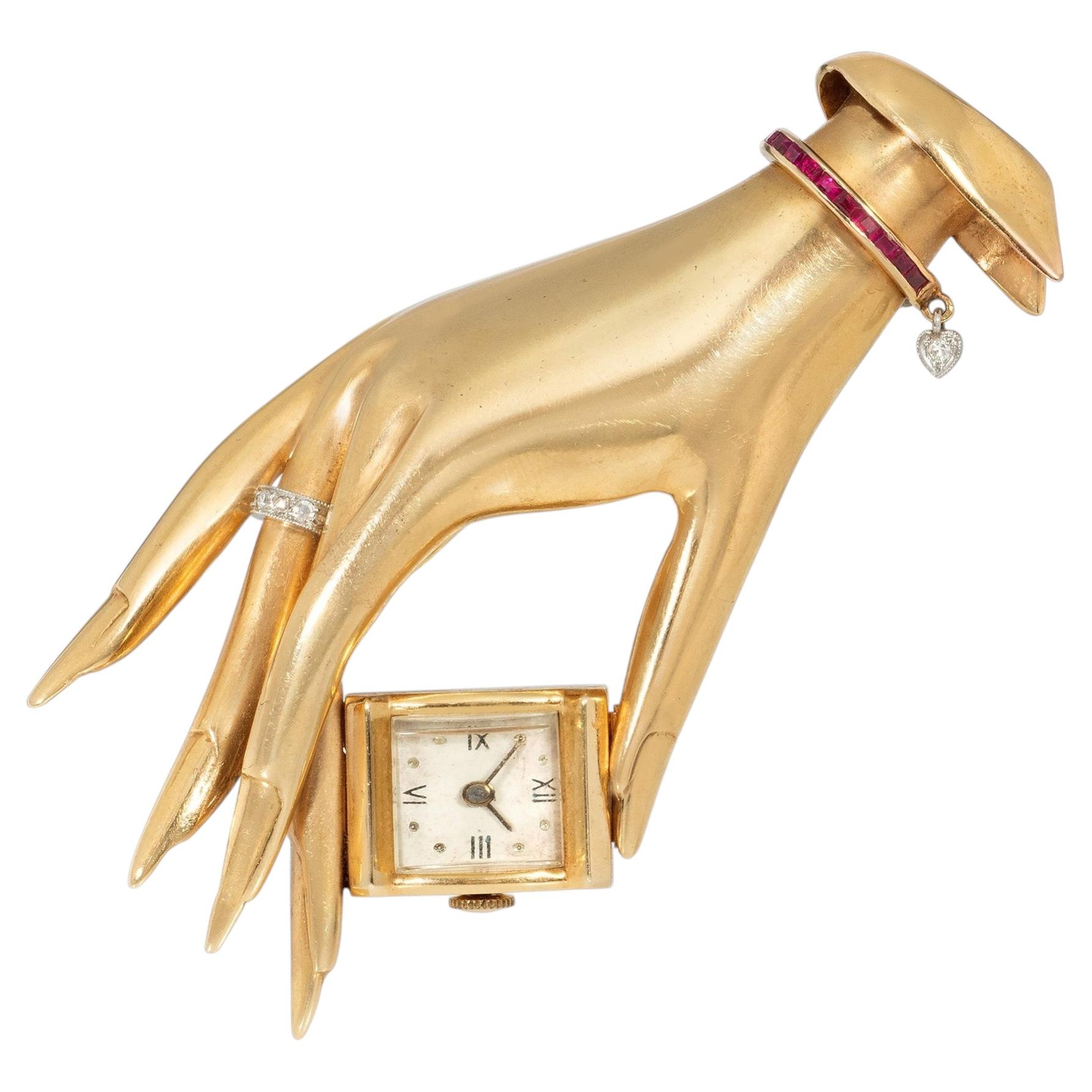 Reloj broche de mano Retro Flato en oro, rubí y diamantes