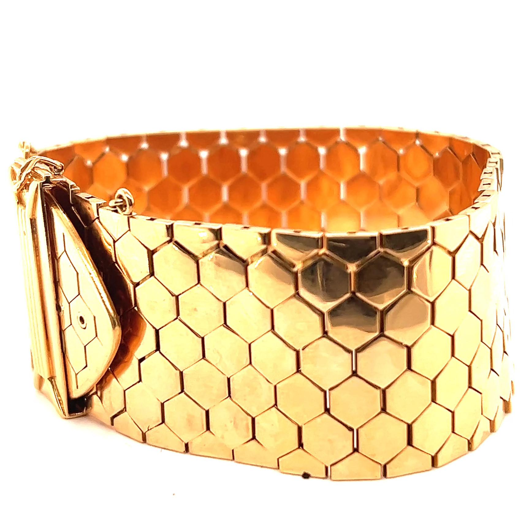 One Retro French 18 Karat Rose Gold Honeycomb Tank Bracelet. Crafted in 18 karat yellow gold with French hallmarks. Circa 1940s. The bracelet is adjustable from 6 inches to 8 inches in length.

About this Item: Spice up your jewelry collection and