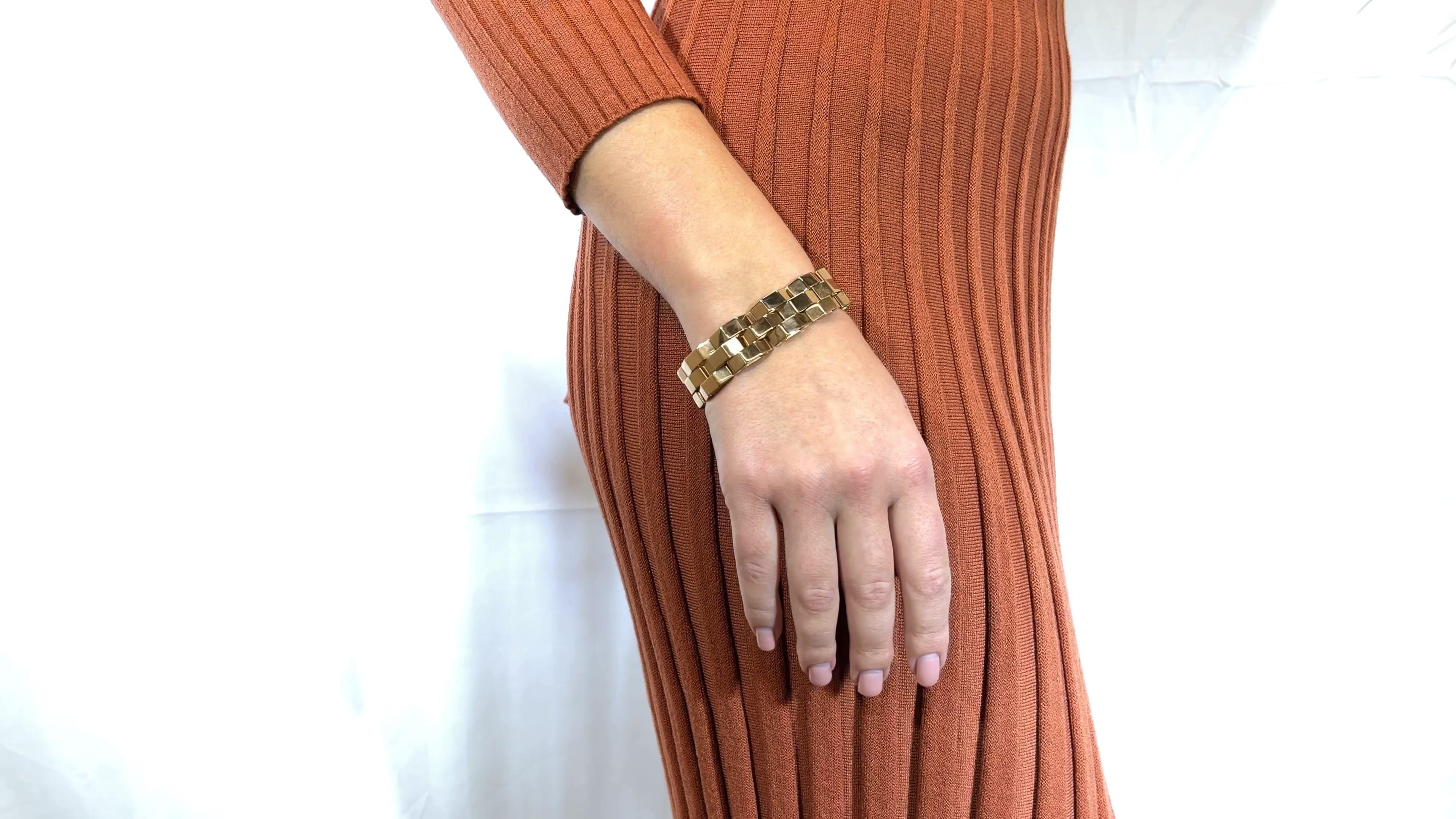 One Retro French 18k Rose Gold Tank Bracelet. Crafted in 18 karat gold with French hallmarks and maker's mark, weighing 86 grams and measuring 6 1/2 inches in length. Circa 1940s.

About The Piece: Do you like a bold gold look? You're in luck