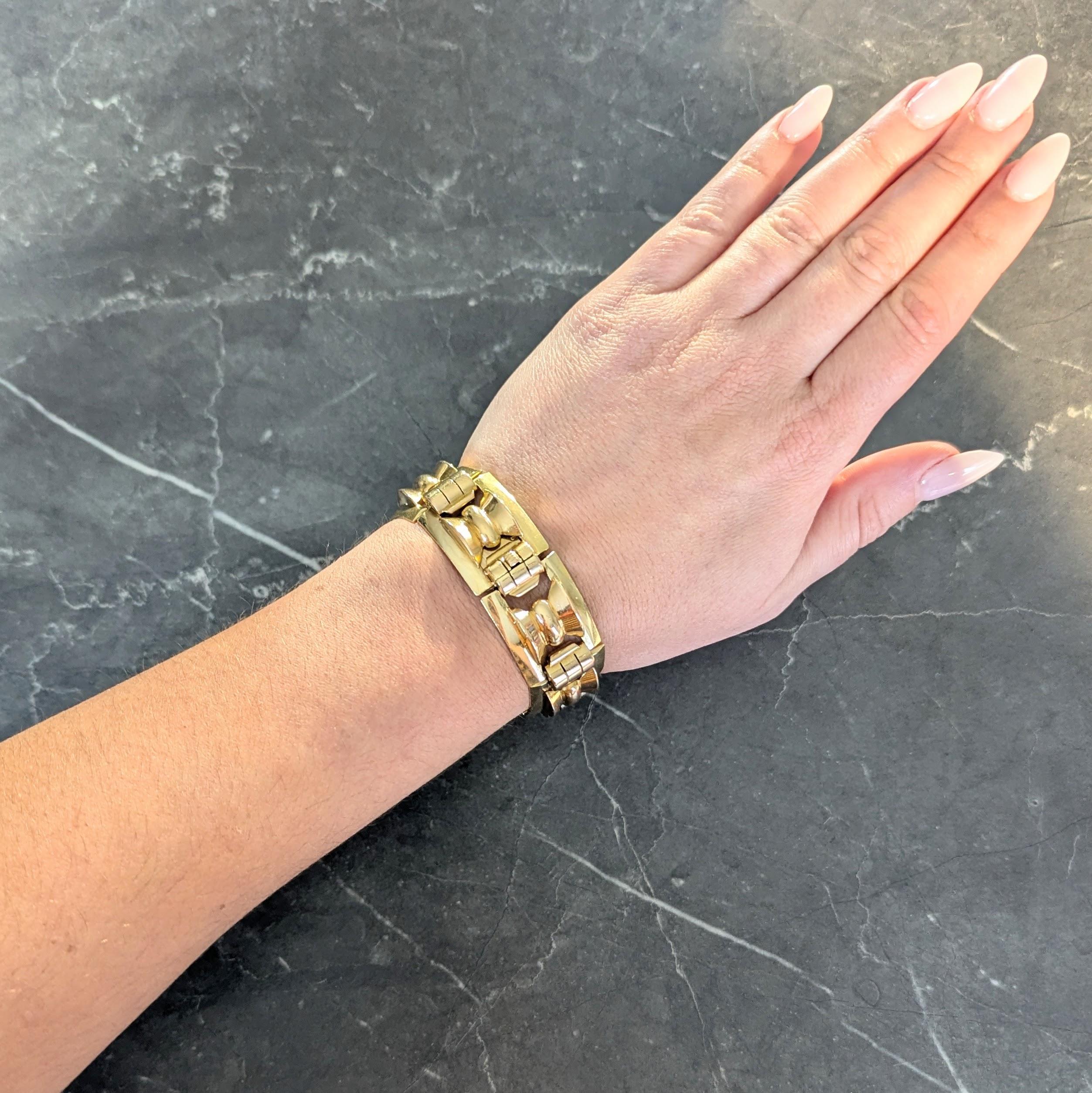 Comprised of pierced yellow gold rectangular links with faceted surface
Centering dimensional bowtie shaped rose gold forms
With grooved rose gold hinges
High polish finish throughout
Completed by concealed clasp closure
Stamped with French