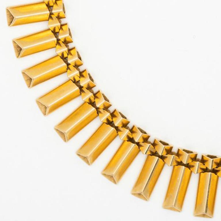 Retro French 18k Yellow Gold Necklace c.1940s

Additional Information:
Period: Retro
Year: 1940s
Material: 18k Yellow Gold 
Weight: 71.55g
Length: 43.4cm/17.08 inches
Condition: Pristine Vintage 
Made in France

The Retro French 18k Yellow Gold