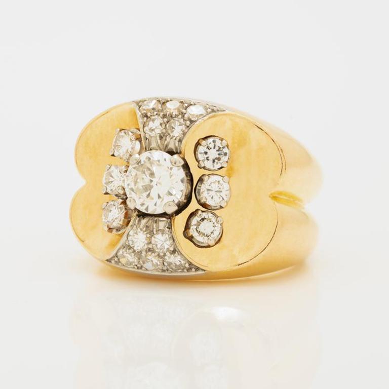 Retro French 18K Yellow Gold, Platinum And 1.50Cts. Old European Cut Diamond Ring C.1940S

Additional Information:
Period: Retro
Year: c.1940s
Material: 18k Yellow Gold, Platinum and 1.50cts. Old European Cut Diamonds
Weight: 12.10g
Current Ring