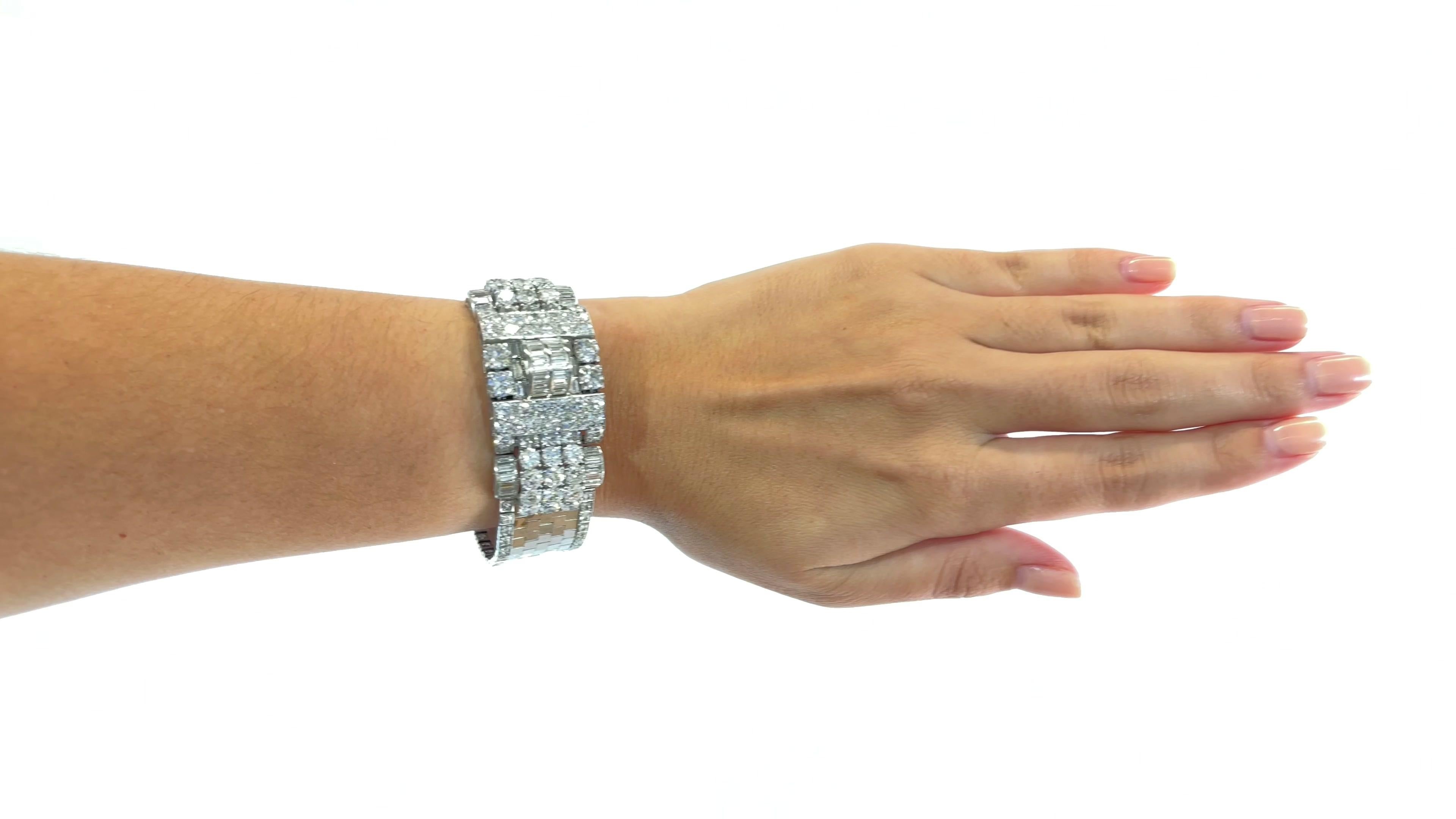 Retro French 25 Carat Diamond Platinum Bracelet. The bracelet features 4 Old European Cut diamonds approximately 2.60 carats, 46 baguettes 2.92 carats, 148 Old European Cuts  19.57 carats, 2 baguettes approximately 0.24 carat. All diamonds are F-G-H