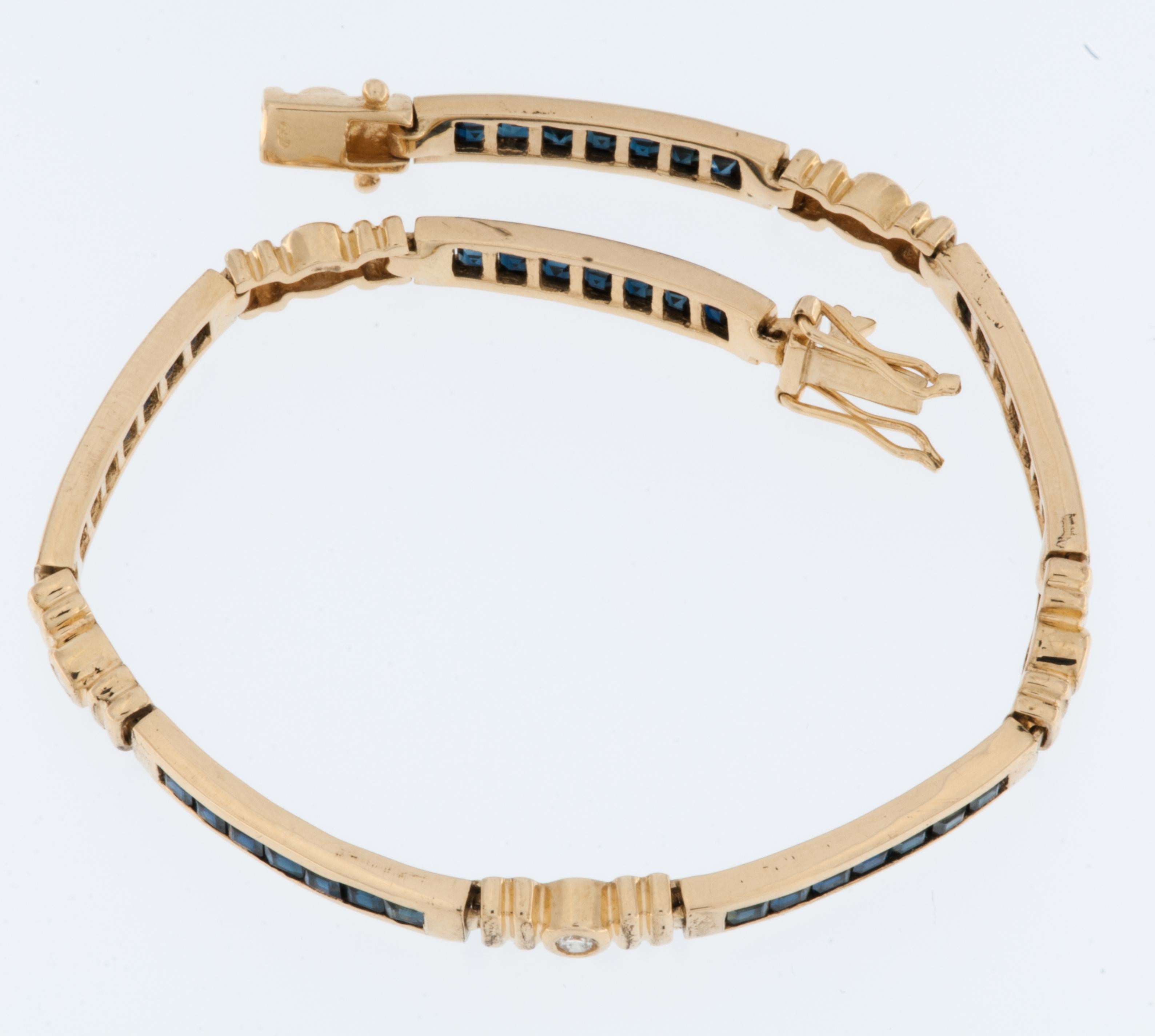Retro Französisches Retro-Armband aus 18 Karat Gelbgold mit Diamanten und Saphiren (Gemischter Schliff) im Angebot