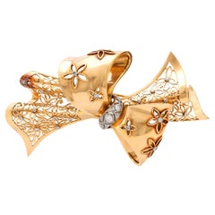 Retro French diamond 18k yellow gold ribbon brooch