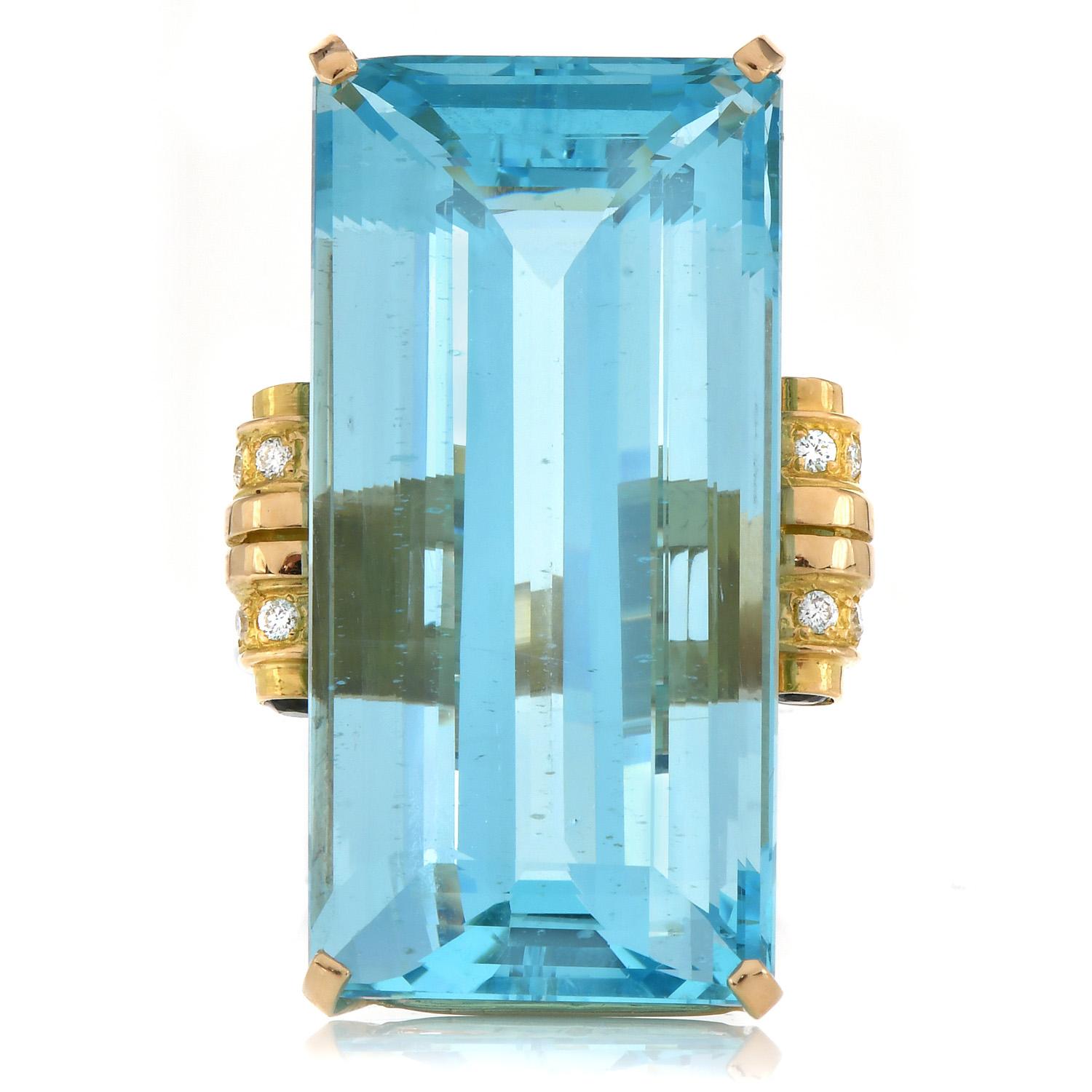 Retro French GIA 83.0ct Aquamarine Diamond 18k Large Cocktail Ring

If you love aquamarine, you will never find another piece as special and unique.

This 1950s ring is Crafted in solid 18K Yellow Gold, Sided by (4) Blue diamonds on each end of the