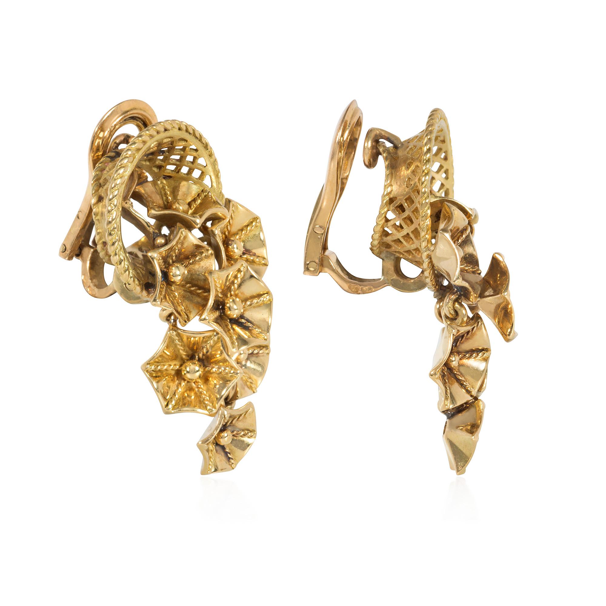 A pair of Retro gold earrings designed as woven baskets with bouquets of tumbling articulated flowers, in 18k with clip backs.  France