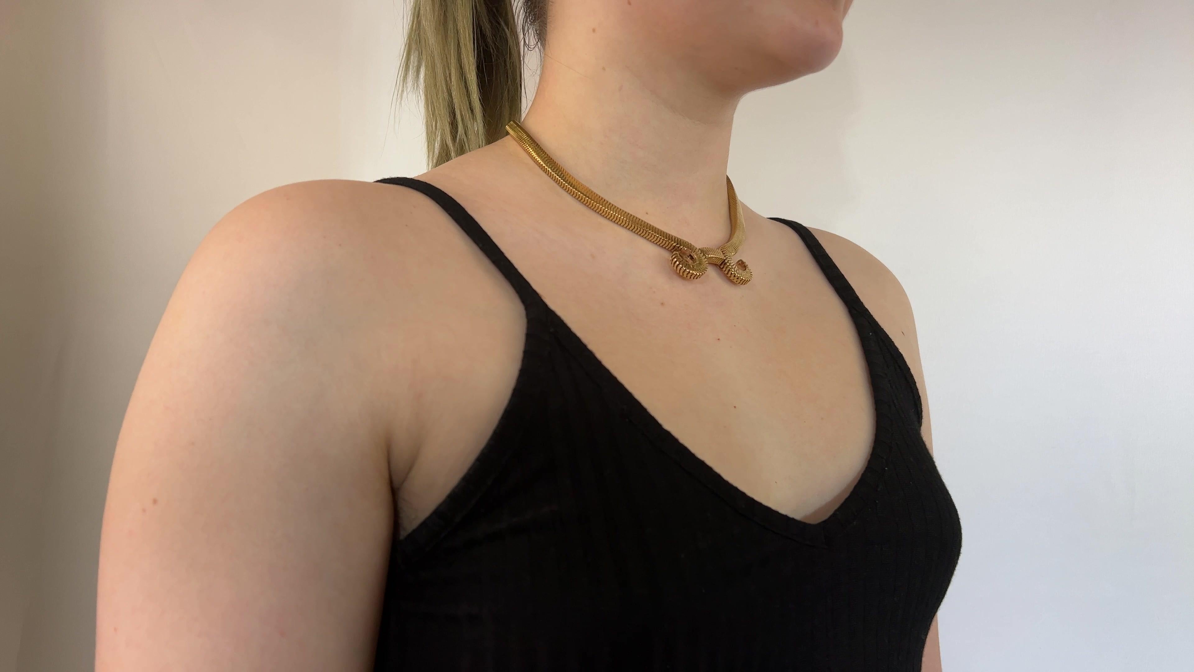 One Retro French Tubogas 18 Karat Gold  Necklace. Crafted in 18 karat gold with French hallmarks. Circa 1940s. The necklace measures 16 1/2 inches.

About this Piece: This Retro French Tubogas Necklace is distinctive of 1940's style. This solid