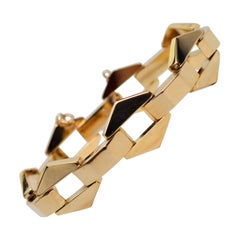 Geometrisches Gliederarmband aus 14 Karat Gelbgold
