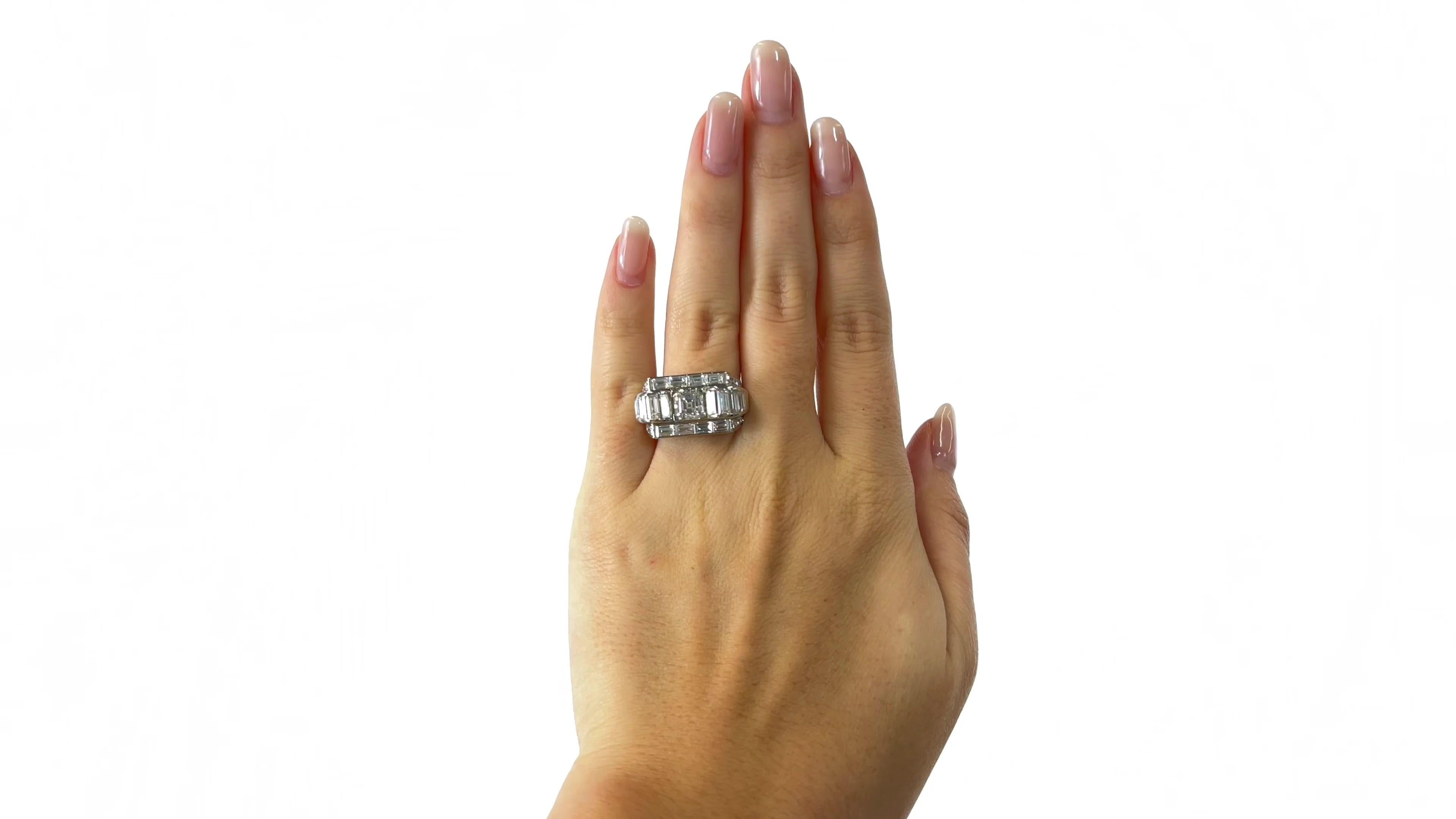 One Retro GIA 1.27 Carat Asscher Cut Diamond Platinum Tank Ring. Featuring one GIA certified 1.27 carat Asscher cut diamond accompanied with certificate #2221174679 stating the diamond is I color, VS2 clarity. Accented by 16 baguette cut diamonds