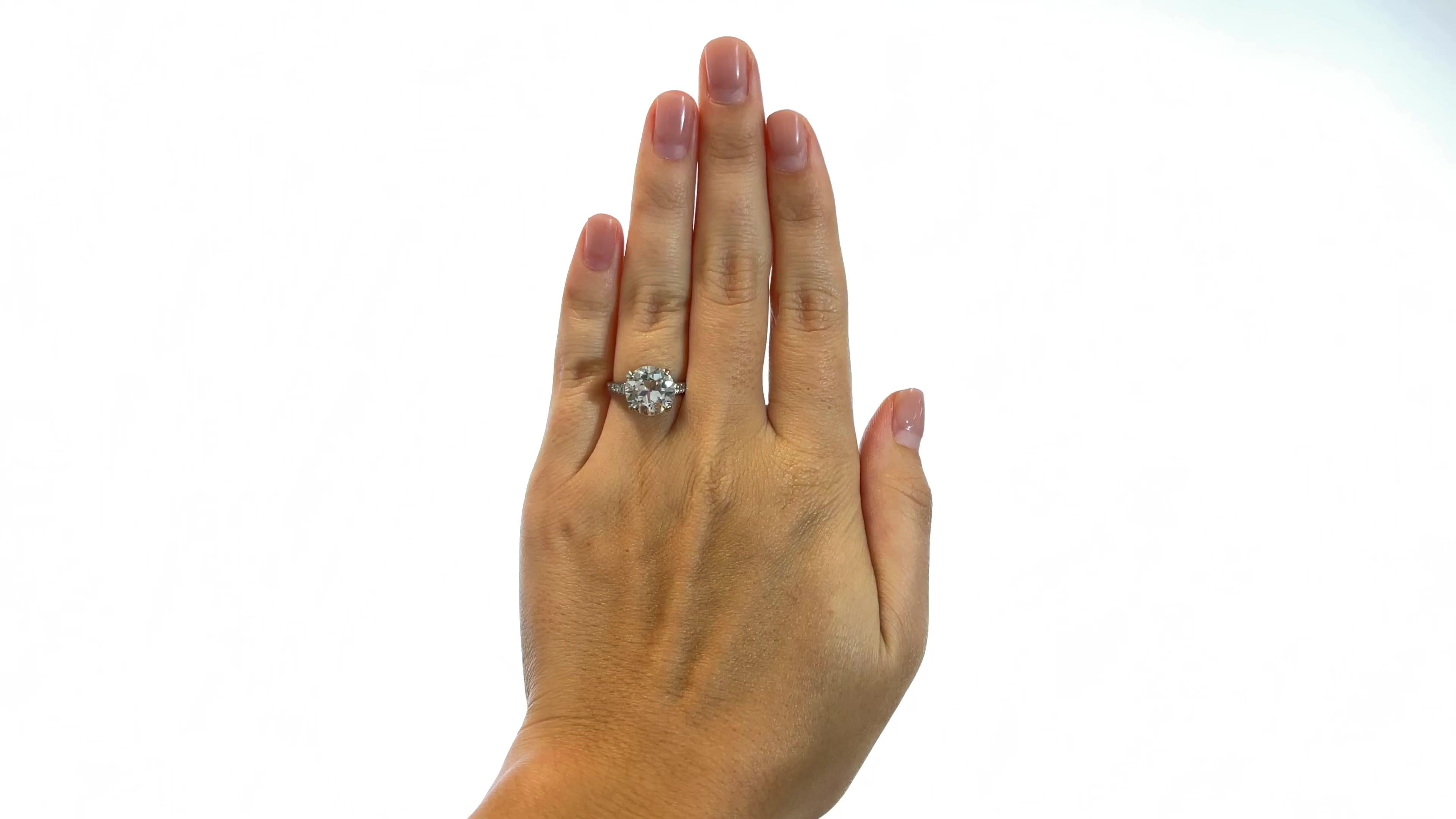 One Retro GIA 3.78 Carat Diamond Platinum Solitaire Engagement Ring. Featuring one GIA certified 3.78 carat old European cut diamond accompanied with certificate #2346061913 stating the diamond is K color, VS2 clarity. Accented by six old European