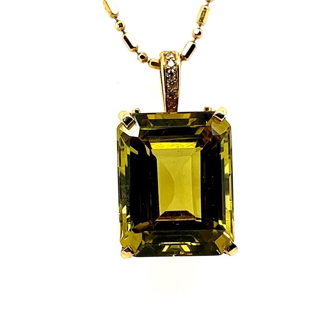 Retro GIA Certified 23.67 Carat Greenish Yellow Natural Chrysoberyl Gold Pendant In Good Condition For Sale In Los Angeles, CA