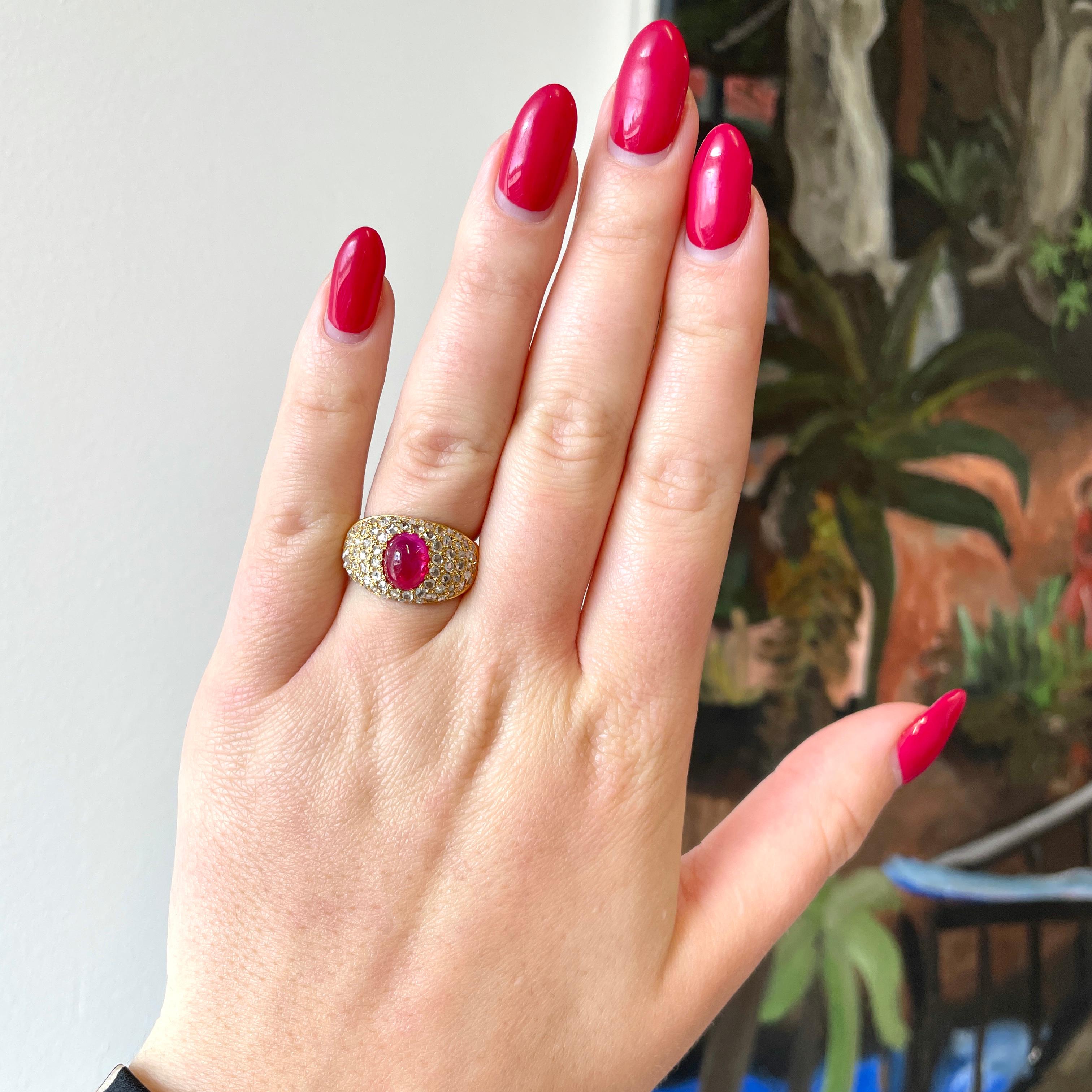 Would you agree that vibrant red ruby and sparkling yellow gold are the perfect combination of colors? This Retro GIA Burma Ruby Diamond 18k Gold Bombe Ring is powerful and irresistible. It features a GIA no heat Burma ruby approximately 2.50 carat.