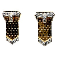 Retro Gold 0.60 Carat Natural Diamond Buckle Earrings Circa 1980