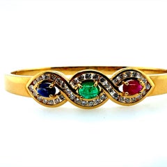 Retro Gold 1.2 CT Natural Diamond
Multicolor CAB Statement Bangle Circa 1980