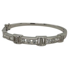 Retro Gold 1.8 Carat Natural Diamond Tension Bangle Bracelet Circa 1990 Retro Gold 1.8 Carat Natural Diamond Tension Bangle Bracelet Circa 1990