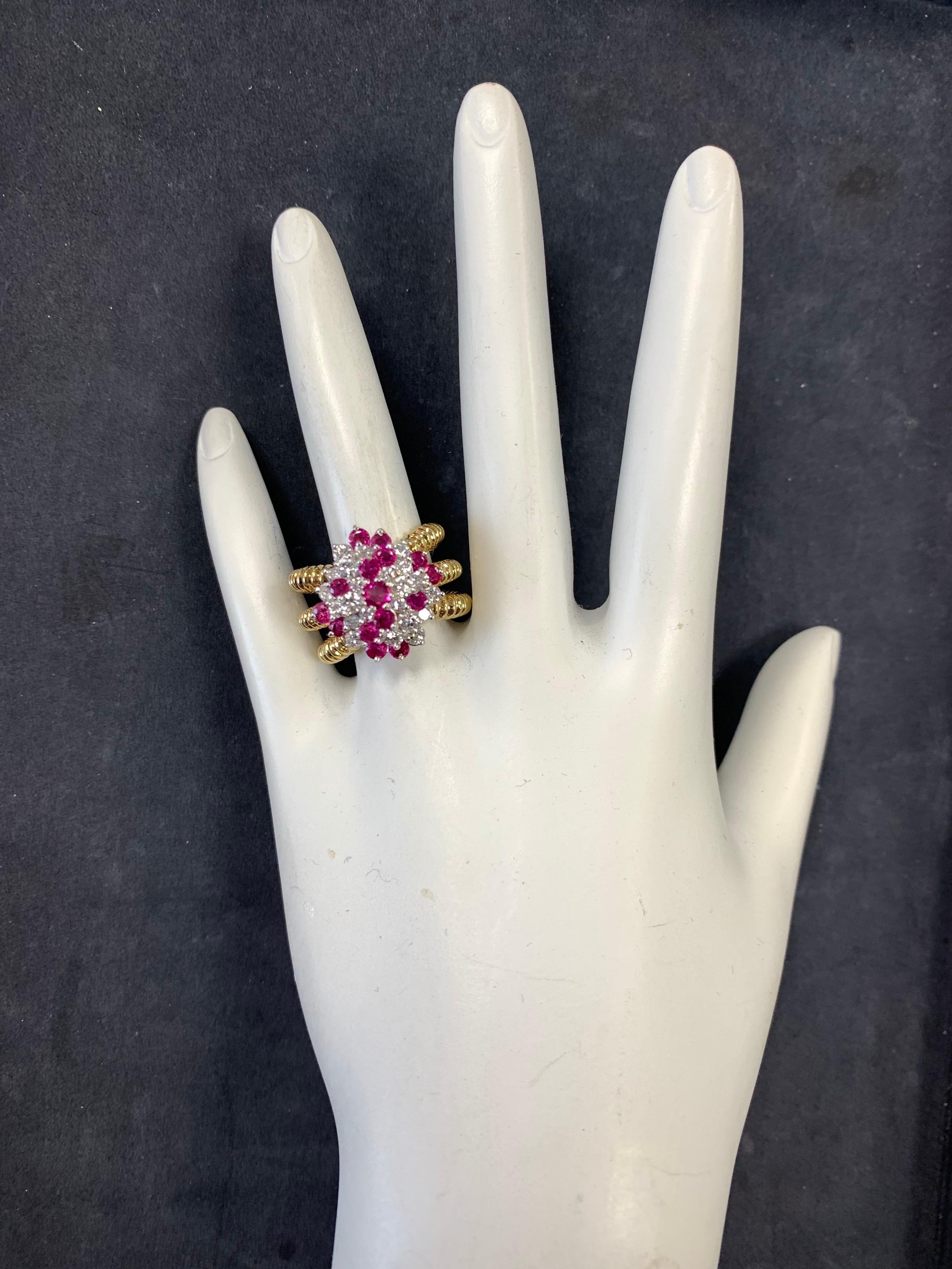 Retro Gold 2 Carat Natural Ruby Gem & Colorless Diamond Cocktail Ring Circa 1960.

Stunning Estate 18k Gold cocktail ring. It is set with 22 round brilliant colorless natural diamonds and 15 natural gem rubies. The weight is approximately 2 carats
