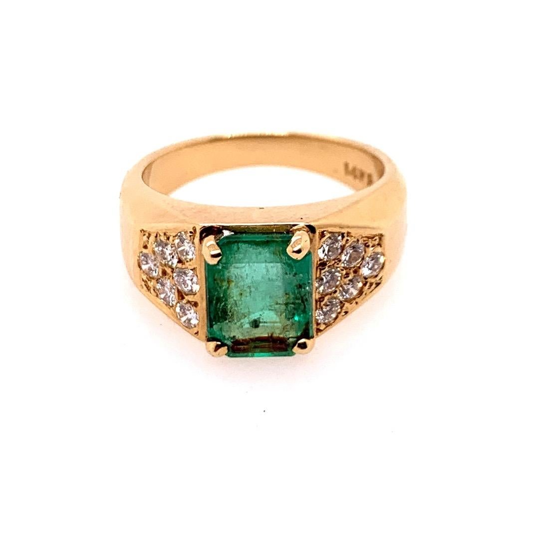 Retro 14k Yellow Gold Cocktail Ring, set with Natural Emerald & Diamonds. Circa 1960. 

The natural green emerald weighs approximately 1.90 carats (9x6.8x4.2mm) and the 12 natural round brilliant diamonds weigh approximately 0.40 carats (G color,