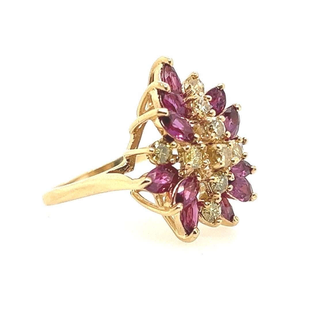Retro 14k Yellow Gold 2.45 Carat Natural Yellow Diamond & Red Ruby Cocktail Ring Circa 1950.

Set with 10 round brilliant yellow diamonds (appx 0.80 carats) and 11 marquise shaped rubies (appx 1.65 carats).

The ring is a size 6.5 and weighs 6.3