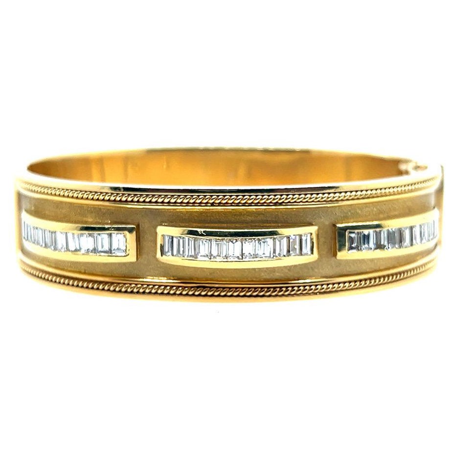 Retro Gold 2.50 Carat Natural Colorless Baguette Diamond Bangle Circa 1970
